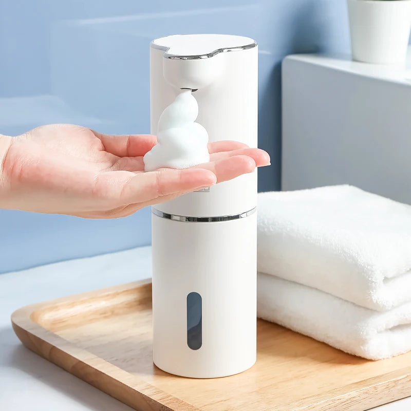 Sleek Automatic Foam Soap Dispenser - Modern touchless dispenser delivers the perfect amount of foamy soap with a simple wave of the hand.